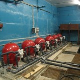 Вид технического помещения с фильтровальными установками бассейна в ФОК