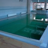 Стационарный переливной бассейн с системой кондиционирования и вентиляции