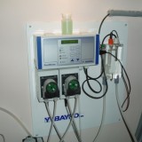 Автоматическая станция для дезинфекции воды активным кислородом в переливном бассейне загородного дома